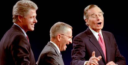 The three candidates for the 1992 US presidential election laugh during the debate: from left, Bill Clinton, Ross Perot and George Bush Sr.